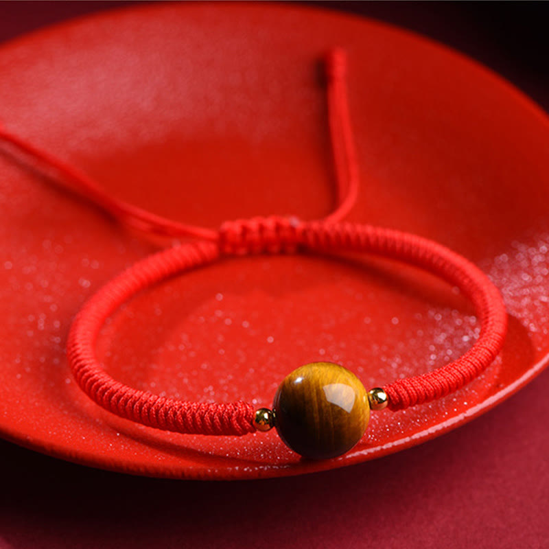 Bracelet en corde de protection porte-bonheur en perles d'œil de tigre faites à la main avec des Buddha Stones