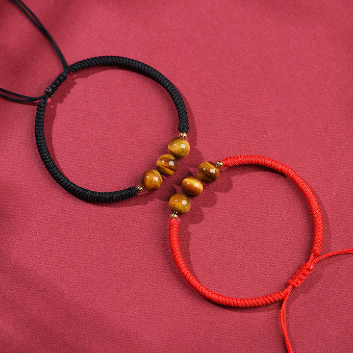 Bracelet en corde de protection porte-bonheur en perles d'œil de tigre faites à la main avec des Buddha Stones