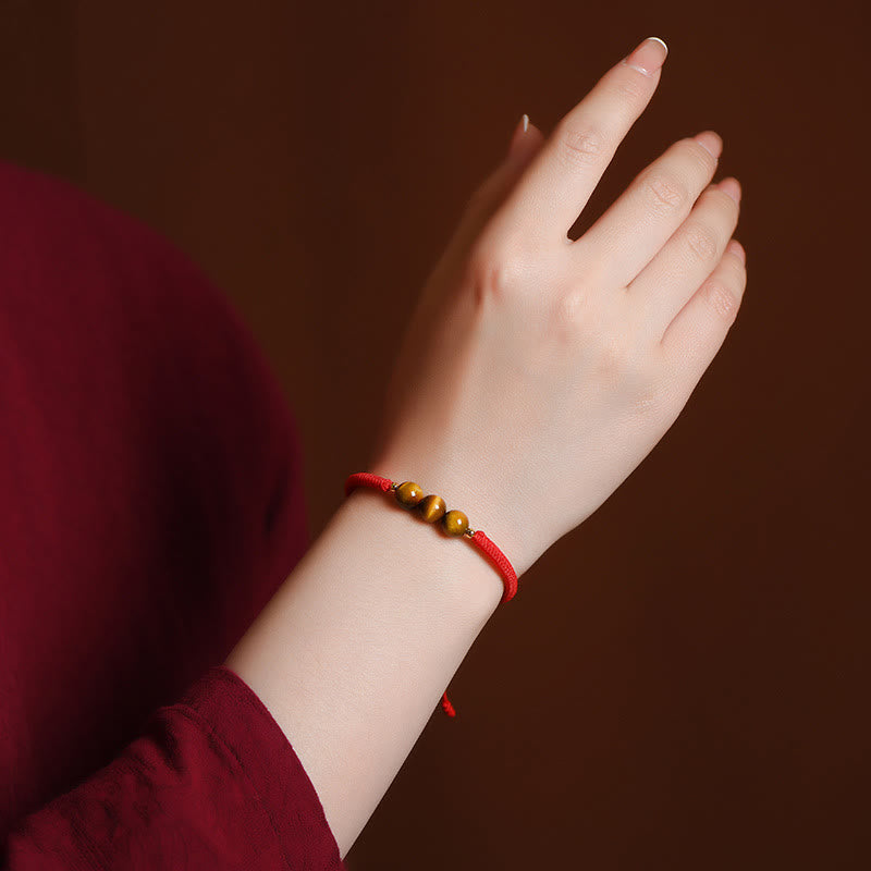 Bracelet en corde de protection porte-bonheur en perles d'œil de tigre faites à la main avec des Buddha Stones