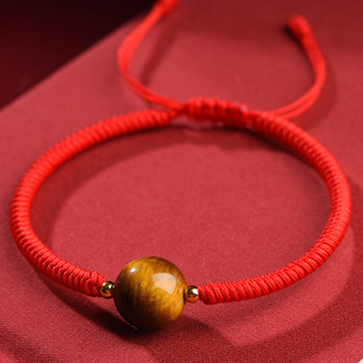 Bracelet en corde de protection porte-bonheur en perles d'œil de tigre faites à la main avec des Buddha Stones