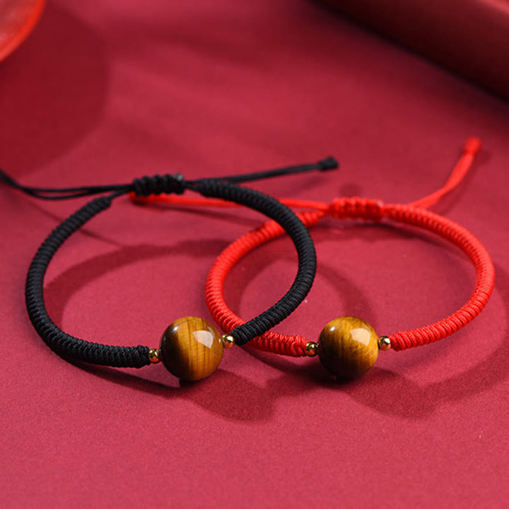 Bracelet en corde de protection porte-bonheur en perles d'œil de tigre faites à la main avec des Buddha Stones