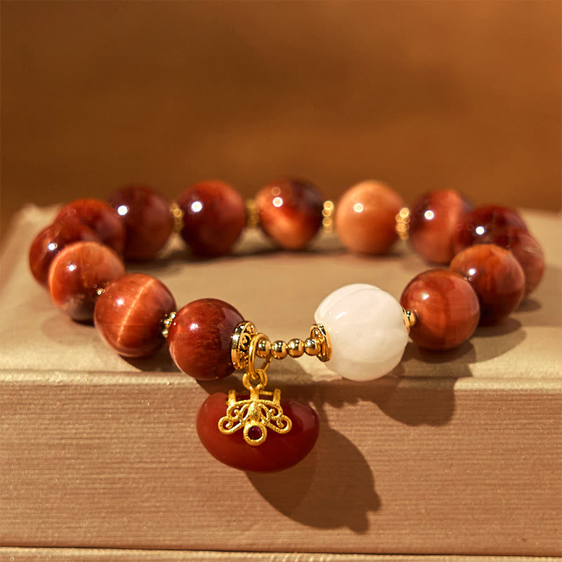 Bracelet calme en œil de tigre rouge naturel de Buddha Stones