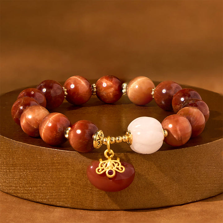 Bracelet calme en œil de tigre rouge naturel de Buddha Stones