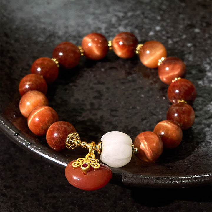 Bracelet calme en œil de tigre rouge naturel de Buddha Stones