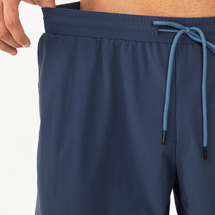 Buddha Stones Short de sport décontracté en nylon respirant et ample à séchage rapide pour homme avec poches
