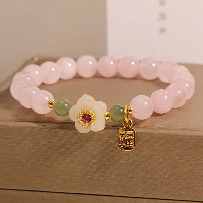 Bracelet de guérison des relations de caractère Fu en jade Hetian en quartz rose et fleur de pêcher en Buddha Stones