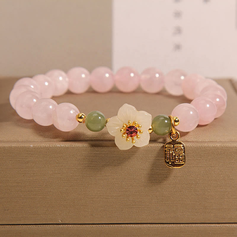Bracelet de guérison des relations de caractère Fu en jade Hetian en quartz rose et fleur de pêcher en Buddha Stones