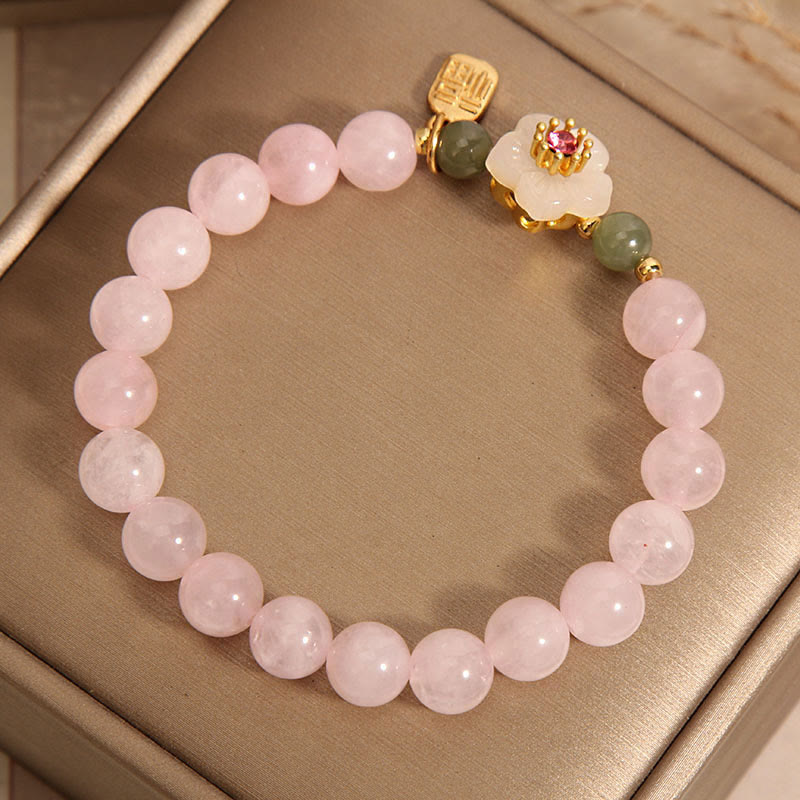 Bracelet de guérison des relations de caractère Fu en jade Hetian en quartz rose et fleur de pêcher en Buddha Stones