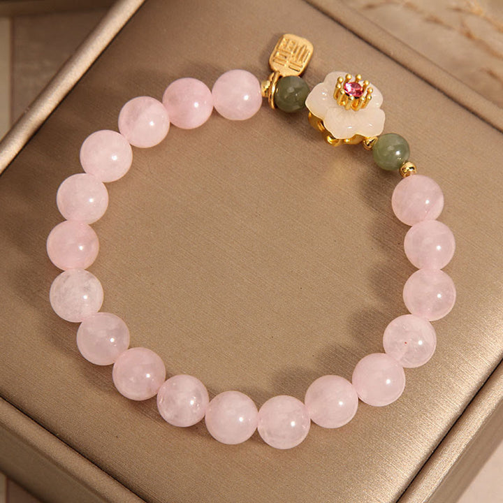 Bracelet de guérison des relations de caractère Fu en jade Hetian en quartz rose et fleur de pêcher en Buddha Stones