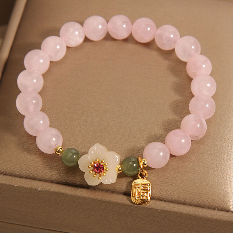 Bracelet de guérison des relations de caractère Fu en jade Hetian en quartz rose et fleur de pêcher en Buddha Stones
