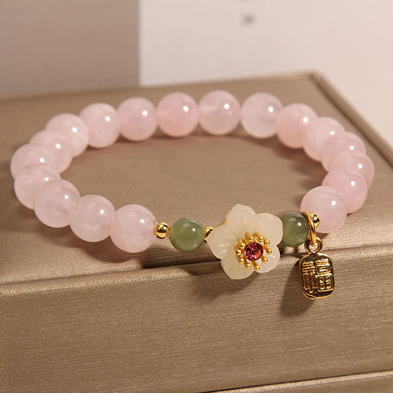 Bracelet de guérison des relations de caractère Fu en jade Hetian en quartz rose et fleur de pêcher en Buddha Stones