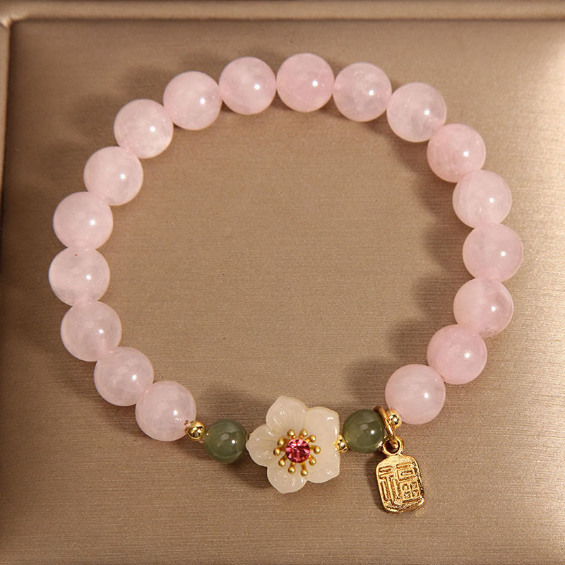 Bracelet de guérison des relations de caractère Fu en jade Hetian en quartz rose et fleur de pêcher en Buddha Stones