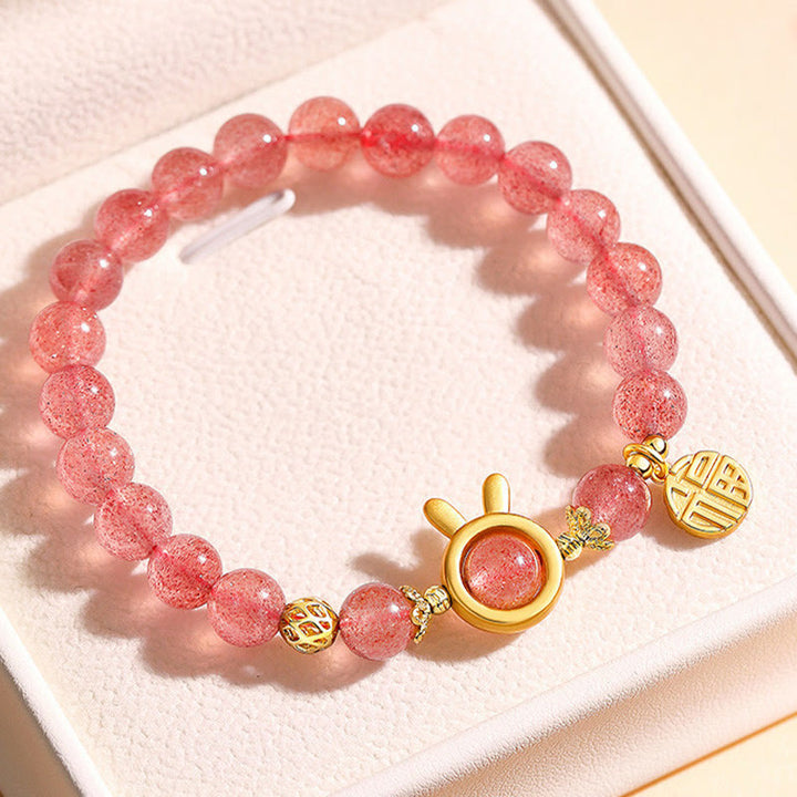 Bracelet à breloques en quartz fraise naturel avec personnage de lapin Fu et Buddha Stones