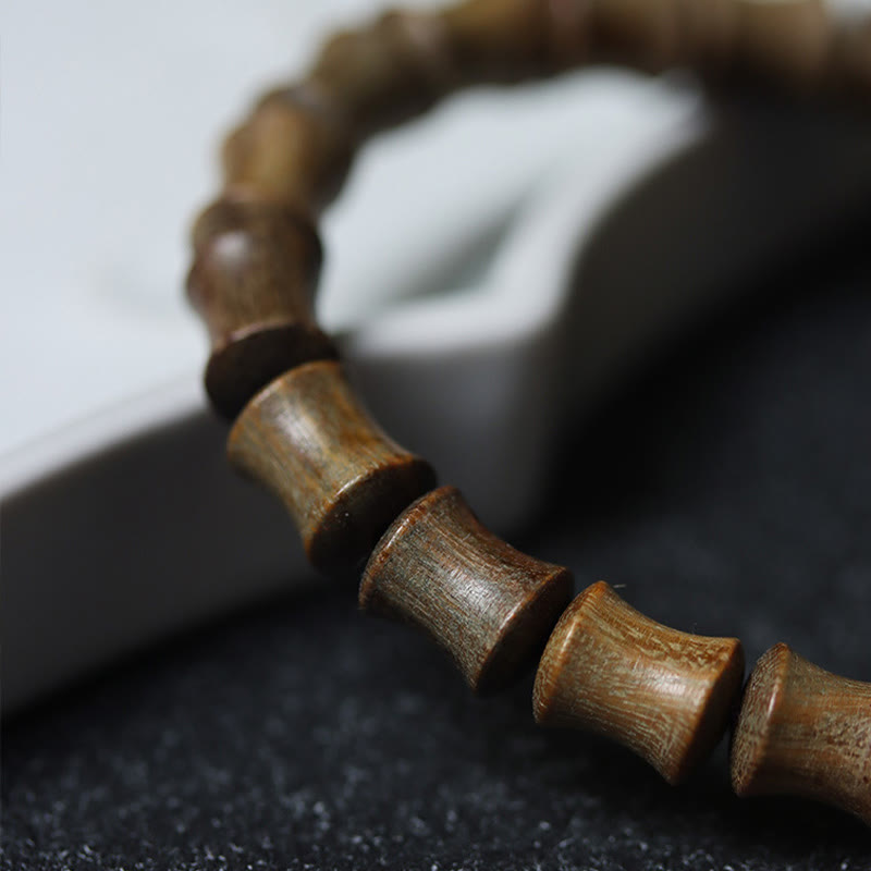 Bracelet de paix en bois de santal vert avec Buddha Stones