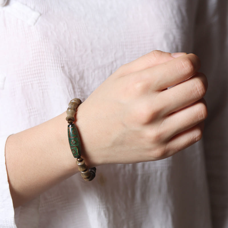 Bracelet de paix en bois de santal vert avec Buddha Stones