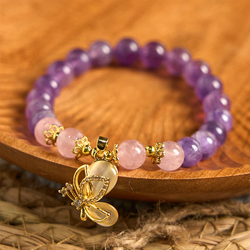 Bracelet à breloques papillon en cristal de quartz fraise et améthyste naturelle de Buddha Stones