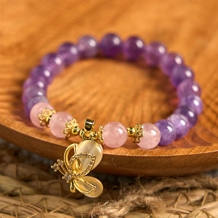 Bracelet à breloques papillon en cristal de quartz fraise et améthyste naturelle de Buddha Stones