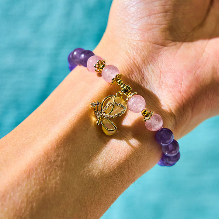 Bracelet à breloques papillon en cristal de quartz fraise et améthyste naturelle de Buddha Stones