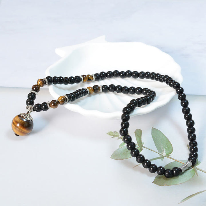 Collier pendentif renforcé en obsidienne noire et œil de tigre avec Buddha Stones