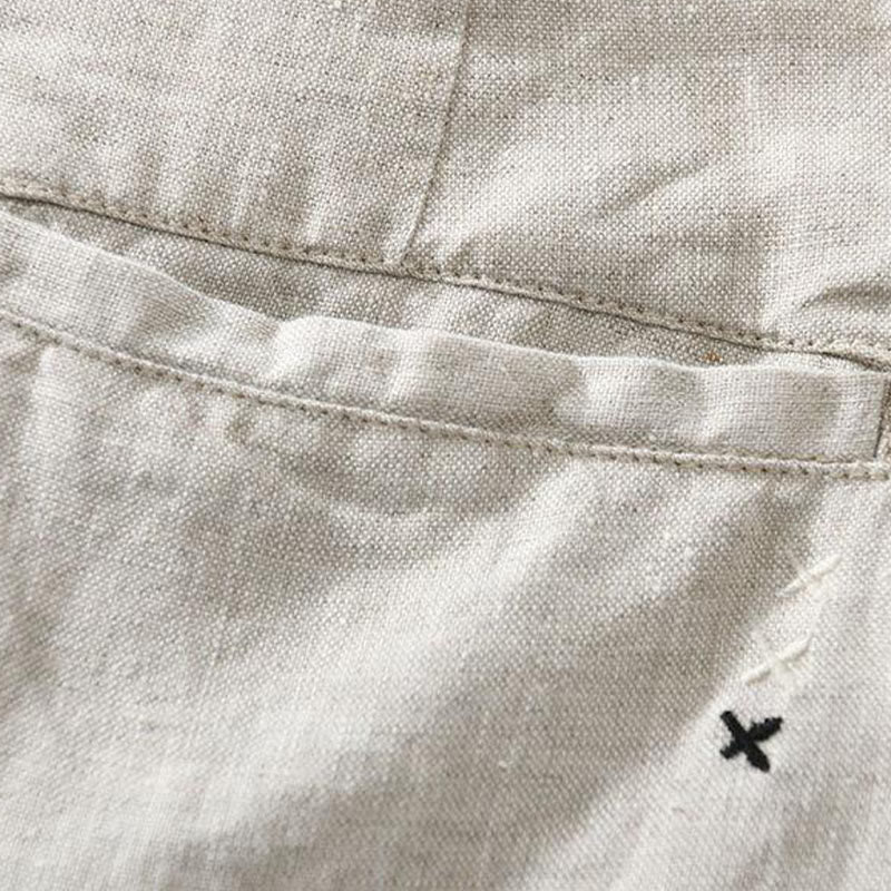 Short homme en lin uni avec cordon de serrage et poches Motif Buddha Stones