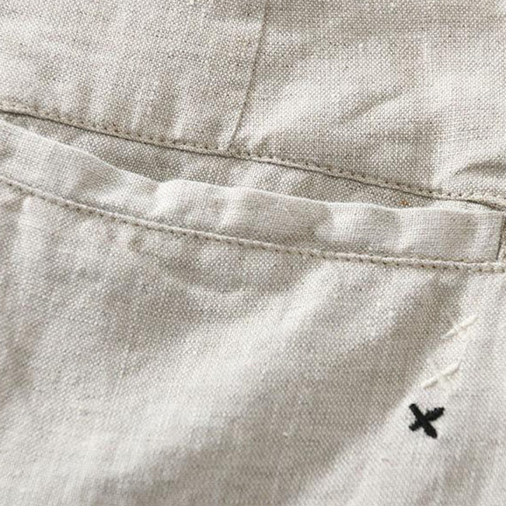 Short homme en lin uni avec cordon de serrage et poches Motif Buddha Stones