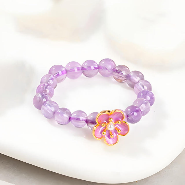 Bague élastique en améthyste et fleur de pêcher de 3 mm Buddha Stones