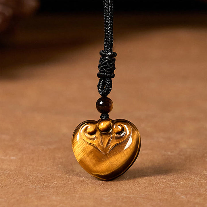Collier pendentif en corde de protection avec motif cœur et œil de tigre naturel en Buddha Stones