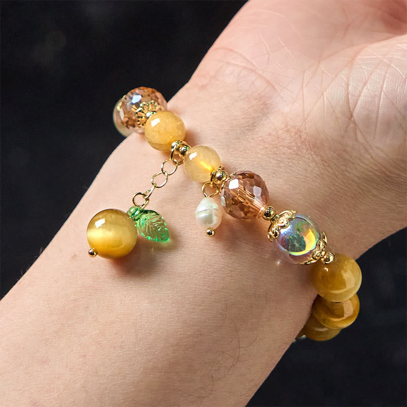 Bracelet courageux en Buddha Stones naturelles œil de tigre et feuilles vertes