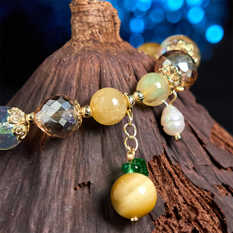 Bracelet courageux en Buddha Stones naturelles œil de tigre et feuilles vertes