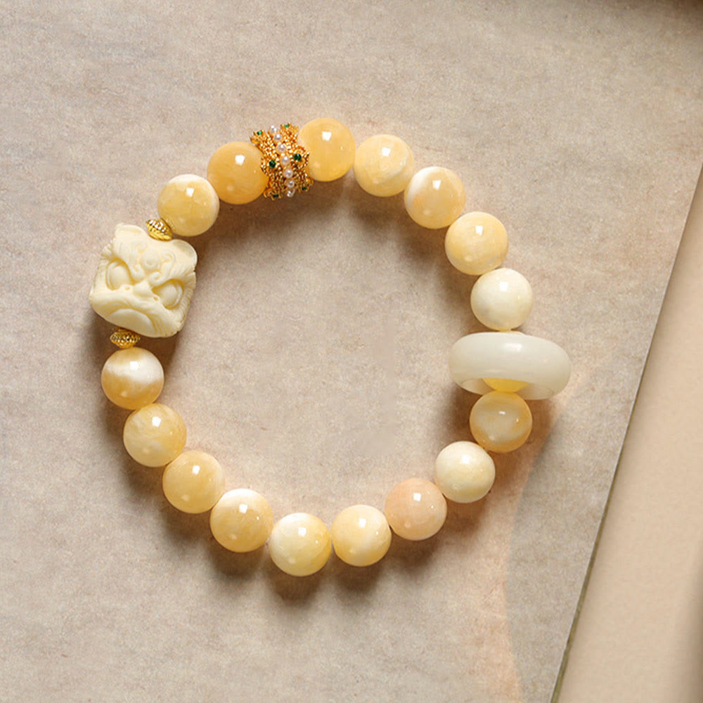 Bracelet de confiance en Buddha Stones, ambre, agate grise, ivoire et fruit