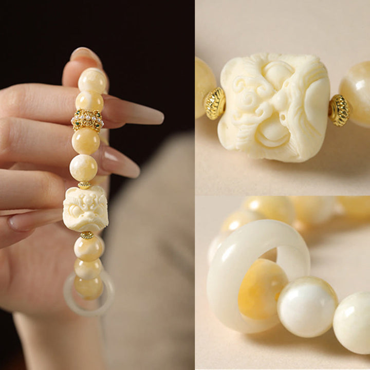 Bracelet de confiance en Buddha Stones, ambre, agate grise, ivoire et fruit