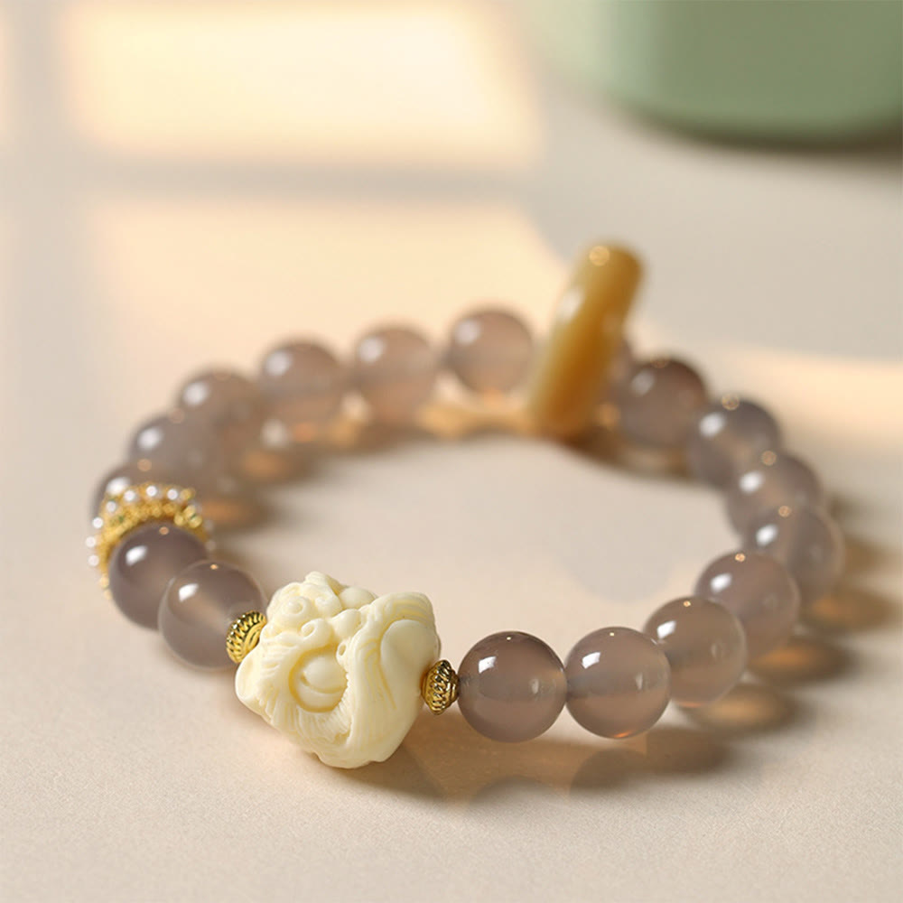 Bracelet de confiance en Buddha Stones, ambre, agate grise, ivoire et fruit
