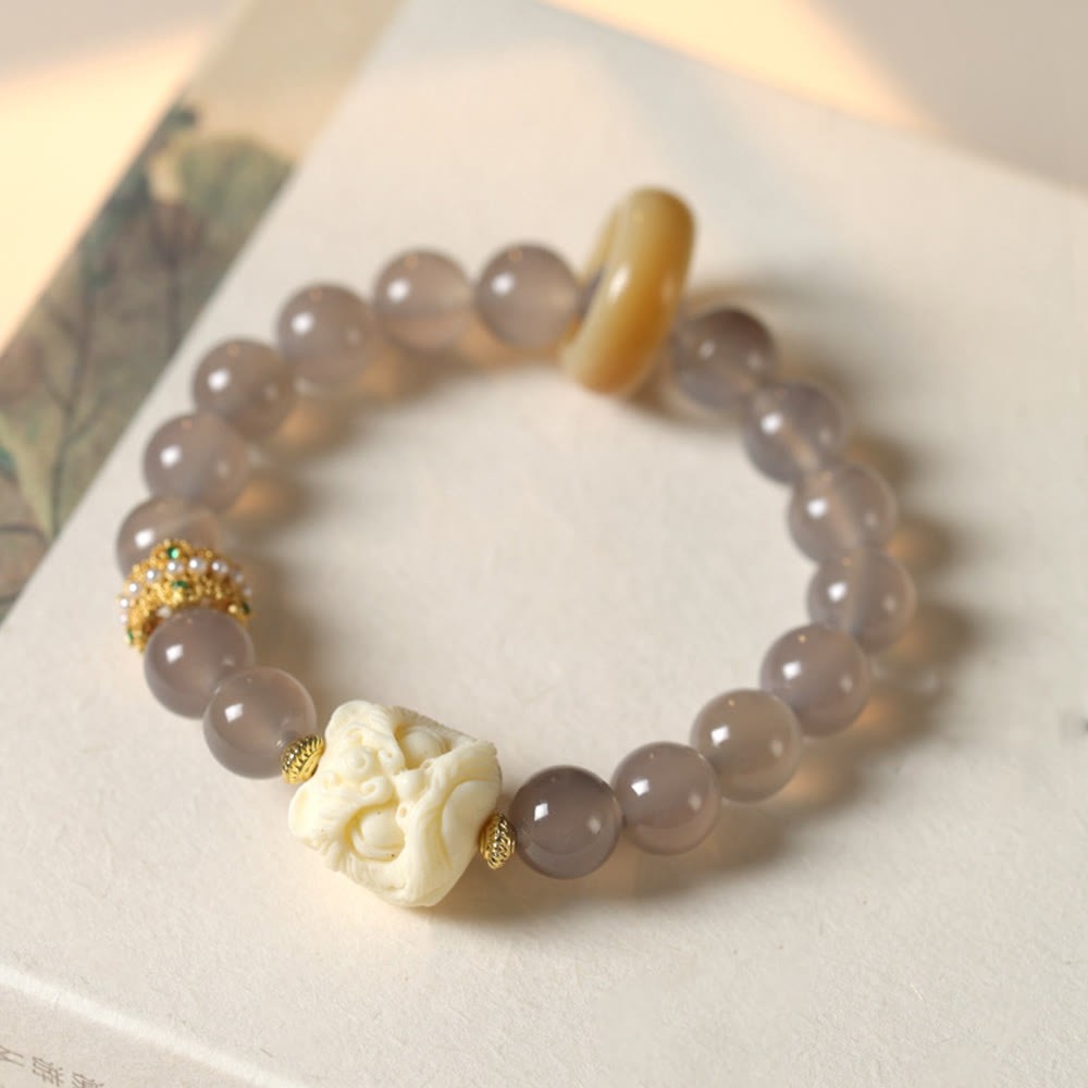 Bracelet de confiance en Buddha Stones, ambre, agate grise, ivoire et fruit