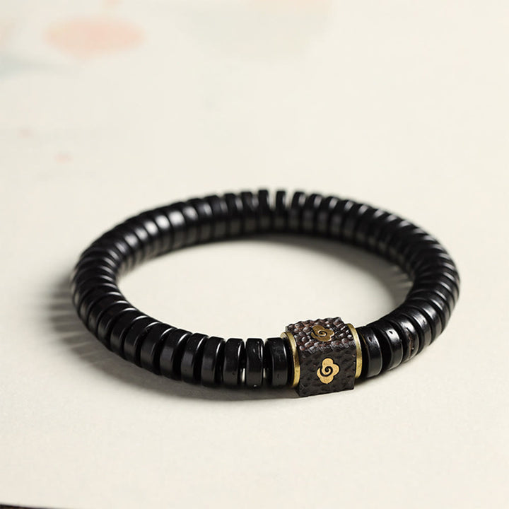 Bracelet tibétain en Buddha Stones et coquille de noix de coco avec nuages de bon augure