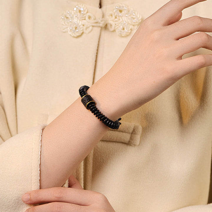 Bracelet tibétain en Buddha Stones et coquille de noix de coco avec nuages de bon augure