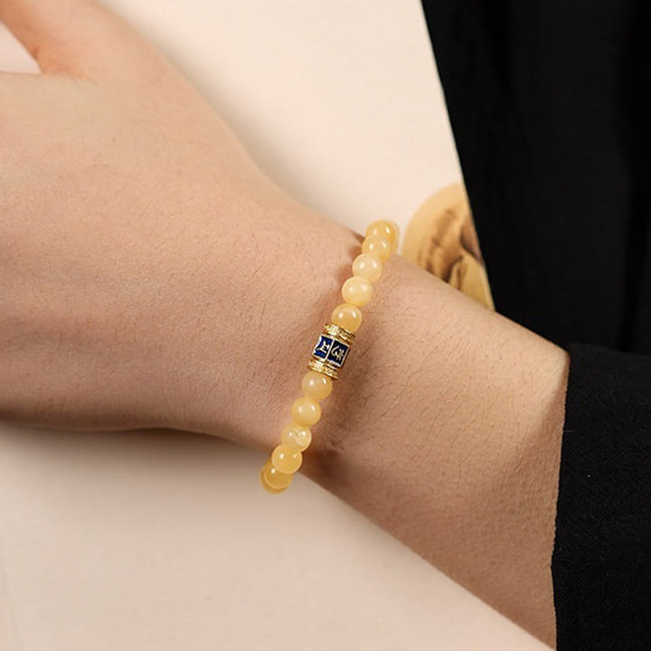 Bracelet de fortune en Buddha Stones , perles de topaze Om Mani Padme Hum