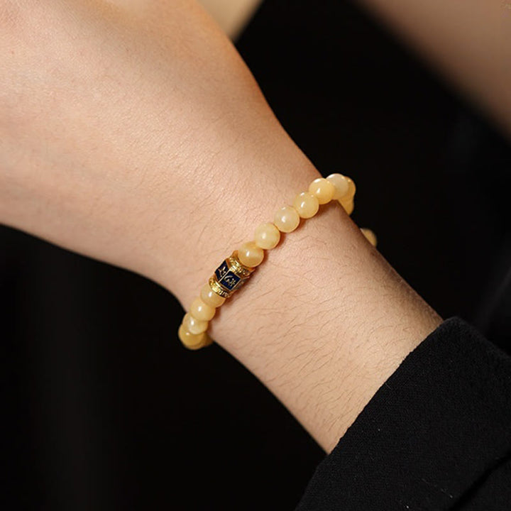 Bracelet de fortune en Buddha Stones , perles de topaze Om Mani Padme Hum