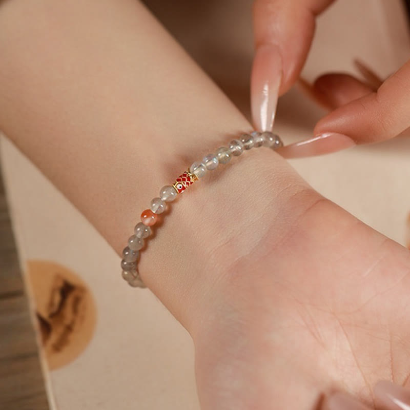Bracelet de guérison ultra-fin en pierre de lune et poisson koï Buddha Stones
