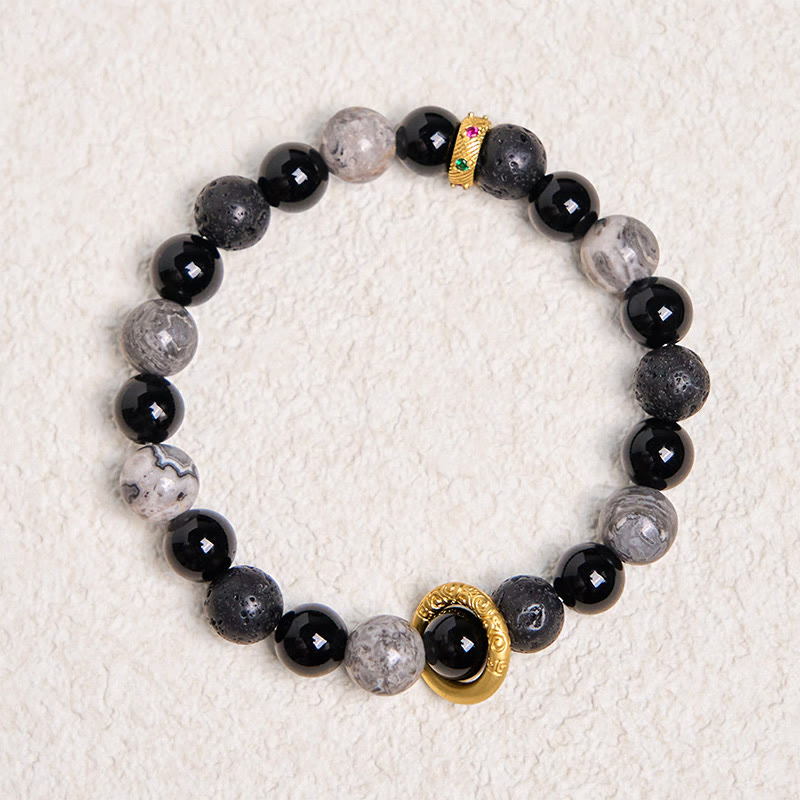 Bracelet de guérison en Buddha Stones de lave, onyx noir, jaspe Picasso