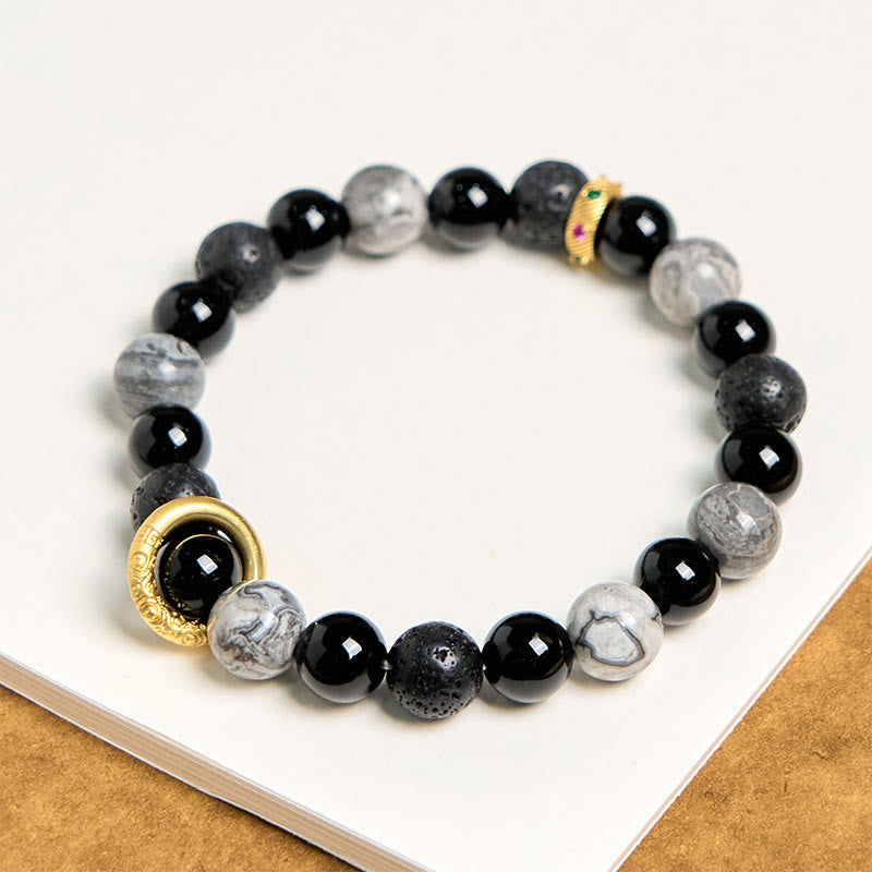 Bracelet de guérison en Buddha Stones de lave, onyx noir, jaspe Picasso