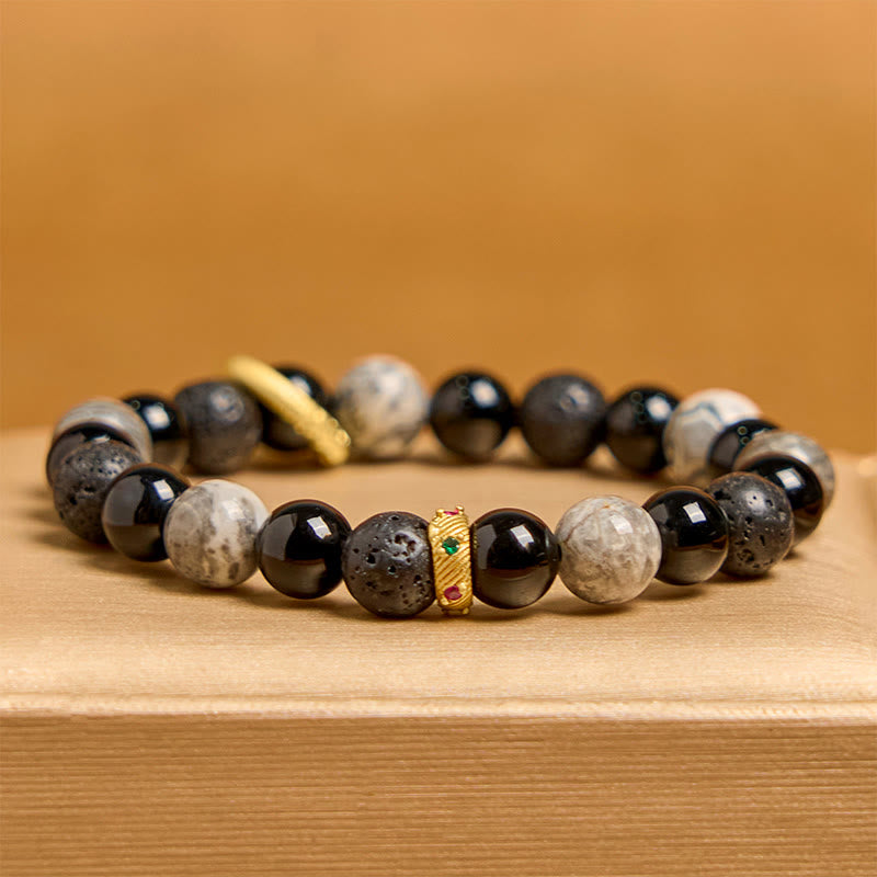 Bracelet de guérison en Buddha Stones de lave, onyx noir, jaspe Picasso