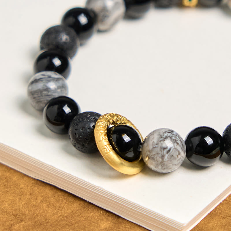 Bracelet de guérison en Buddha Stones de lave, onyx noir, jaspe Picasso