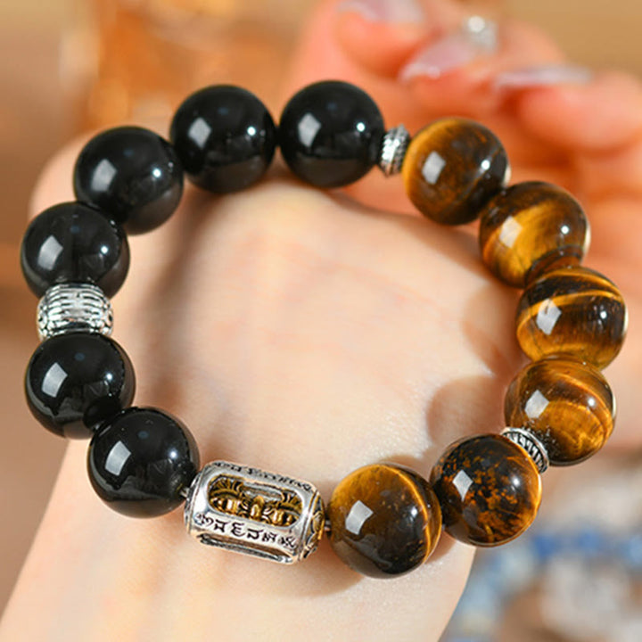 Bracelet de protection Vajra en obsidienne Buddha Stones de tigre et argent naturel