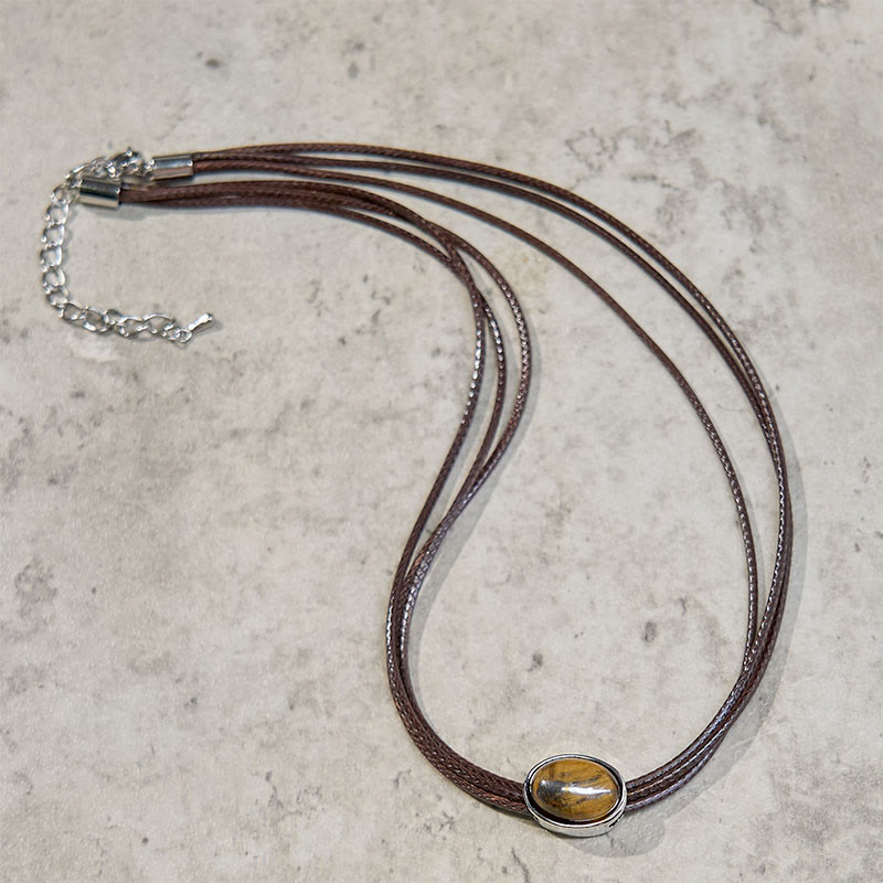 Collier avec pendentif en corde de cire et ellipse en œil de tigre naturel et Buddha Stones
