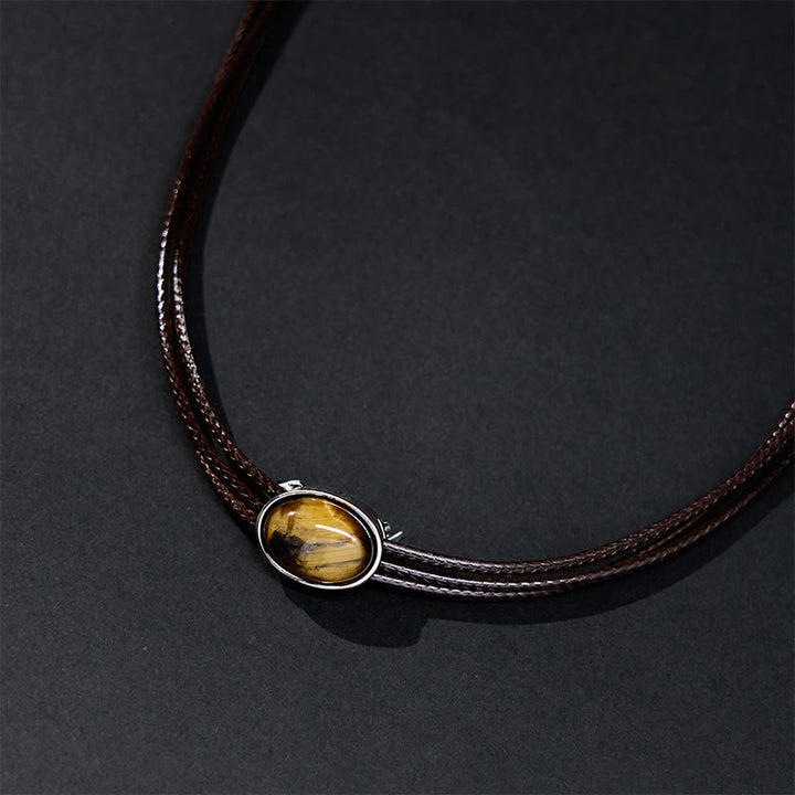 Collier avec pendentif en corde de cire et ellipse en œil de tigre naturel et Buddha Stones
