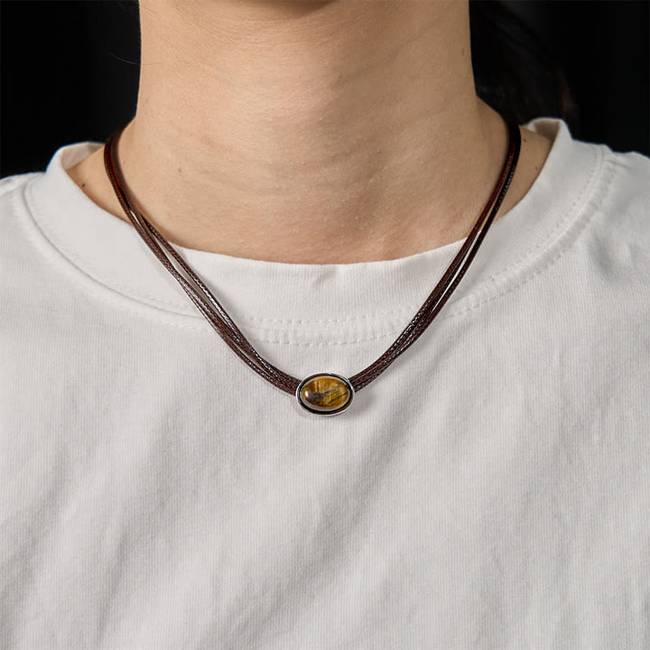 Collier avec pendentif en corde de cire et ellipse en œil de tigre naturel et Buddha Stones