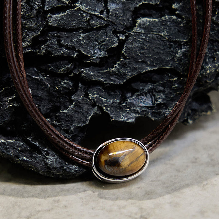 Collier avec pendentif en corde de cire et ellipse en œil de tigre naturel et Buddha Stones