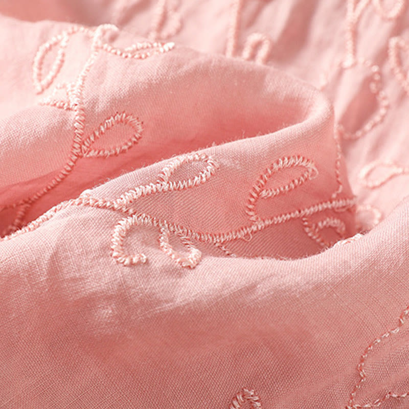 Chemise à manches courtes en coton pour femme avec col montant et boutons brodés de Buddha Stones