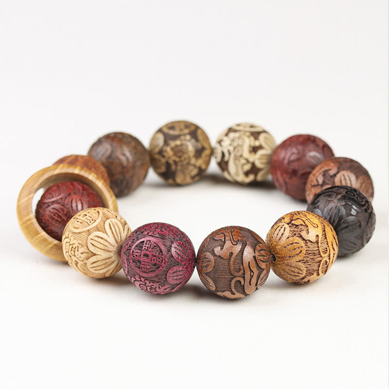 Bracelet de guérison en bois de santal sculpté avec Buddha Stones et symbole du zodiaque chinois, dragon, phénix, caractère Fu