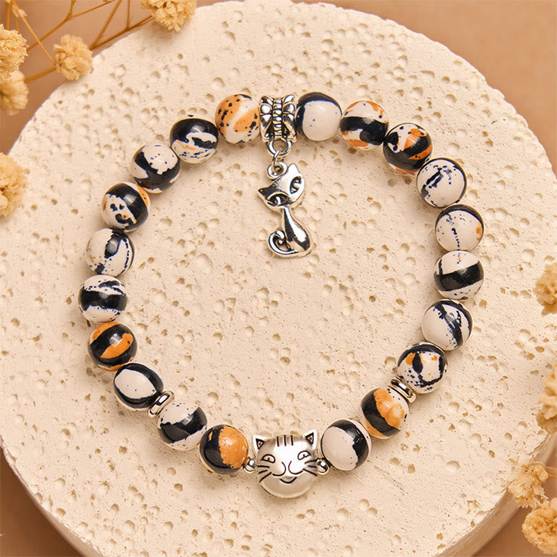Bracelet de confiance en perles de pierre naturelle en forme de chat Calico de Buddha Stones - image 1